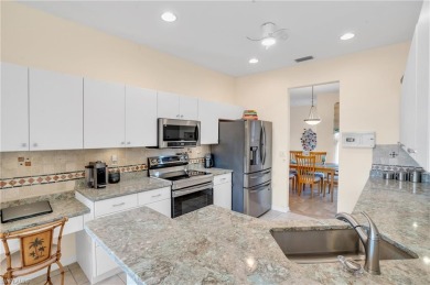 **Stunning Condo with Lake and Sunset Views in Premier Pelican on Pelican Marsh Golf Club in Florida - for sale on GolfHomes.com, golf home, golf lot