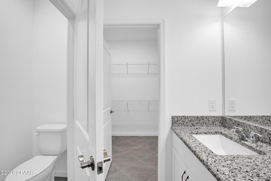 Step into this NEWER beautifully maintained , barely lived in on LPGA International Golf Course in Florida - for sale on GolfHomes.com, golf home, golf lot