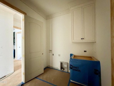 Experience timeless elegance and modern sophistication in this on North Ridge Country Club in North Carolina - for sale on GolfHomes.com, golf home, golf lot