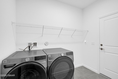 Step into this NEWER beautifully maintained , barely lived in on LPGA International Golf Course in Florida - for sale on GolfHomes.com, golf home, golf lot