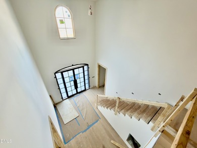 Experience timeless elegance and modern sophistication in this on North Ridge Country Club in North Carolina - for sale on GolfHomes.com, golf home, golf lot