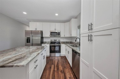 Brand new duplexes MOVE IN READY! Each Unit contains 2 bedrooms on Twin Isles Country Club in Florida - for sale on GolfHomes.com, golf home, golf lot