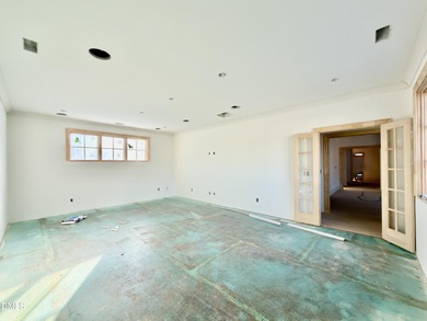 Experience timeless elegance and modern sophistication in this on North Ridge Country Club in North Carolina - for sale on GolfHomes.com, golf home, golf lot