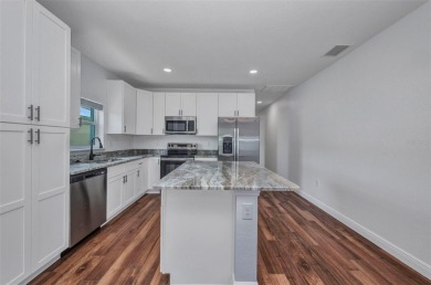 Brand new duplexes MOVE IN READY! Each Unit contains 2 bedrooms on Twin Isles Country Club in Florida - for sale on GolfHomes.com, golf home, golf lot