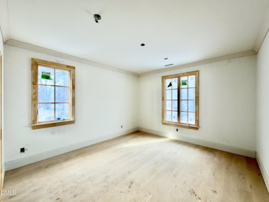 Experience timeless elegance and modern sophistication in this on North Ridge Country Club in North Carolina - for sale on GolfHomes.com, golf home, golf lot