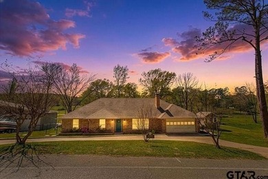 This beautifully maintained traditional-style home offers 3 on Hide-A-Way Lake Golf Course in Texas - for sale on GolfHomes.com, golf home, golf lot