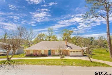This beautifully maintained traditional-style home offers 3 on Hide-A-Way Lake Golf Course in Texas - for sale on GolfHomes.com, golf home, golf lot