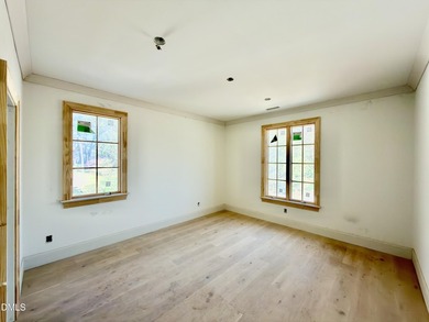 Experience timeless elegance and modern sophistication in this on North Ridge Country Club in North Carolina - for sale on GolfHomes.com, golf home, golf lot