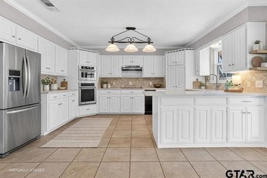 This beautifully maintained traditional-style home offers 3 on Hide-A-Way Lake Golf Course in Texas - for sale on GolfHomes.com, golf home, golf lot