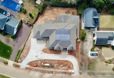 Experience timeless elegance and modern sophistication in this on North Ridge Country Club in North Carolina - for sale on GolfHomes.com, golf home, golf lot