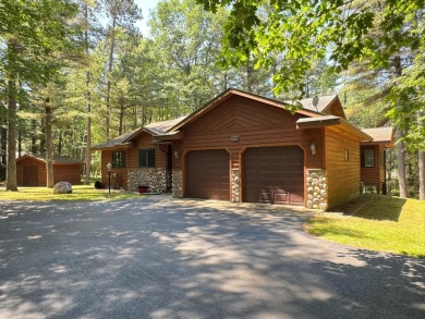 Tucked back on a nicely wooded lot, this TIMBER RIDGE home on Timber Ridge Golf Club in Wisconsin - for sale on GolfHomes.com, golf home, golf lot