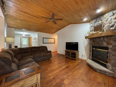 Tucked back on a nicely wooded lot, this TIMBER RIDGE home on Timber Ridge Golf Club in Wisconsin - for sale on GolfHomes.com, golf home, golf lot