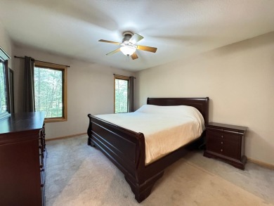 Tucked back on a nicely wooded lot, this TIMBER RIDGE home on Timber Ridge Golf Club in Wisconsin - for sale on GolfHomes.com, golf home, golf lot