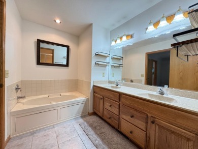 Tucked back on a nicely wooded lot, this TIMBER RIDGE home on Timber Ridge Golf Club in Wisconsin - for sale on GolfHomes.com, golf home, golf lot