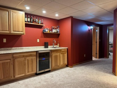 Tucked back on a nicely wooded lot, this TIMBER RIDGE home on Timber Ridge Golf Club in Wisconsin - for sale on GolfHomes.com, golf home, golf lot