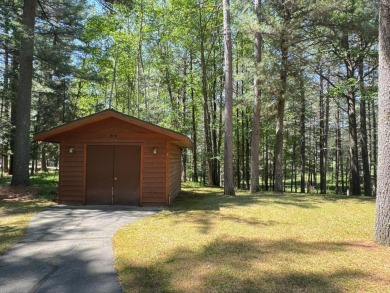 Tucked back on a nicely wooded lot, this TIMBER RIDGE home on Timber Ridge Golf Club in Wisconsin - for sale on GolfHomes.com, golf home, golf lot