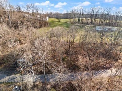 Discover this buildable lot totaling 0.36 acres, perfectly on Old English Golf Course in Indiana - for sale on GolfHomes.com, golf home, golf lot