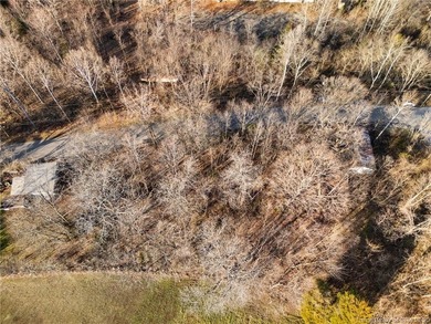 Discover this buildable lot totaling 0.36 acres, perfectly on Old English Golf Course in Indiana - for sale on GolfHomes.com, golf home, golf lot