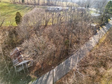 Discover this buildable lot totaling 0.36 acres, perfectly on Old English Golf Course in Indiana - for sale on GolfHomes.com, golf home, golf lot