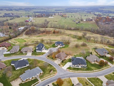 Welcome to 115 Ironwood, a beautifully maintained 5-bedroom, 3 on Island Green Golf Club in Missouri - for sale on GolfHomes.com, golf home, golf lot