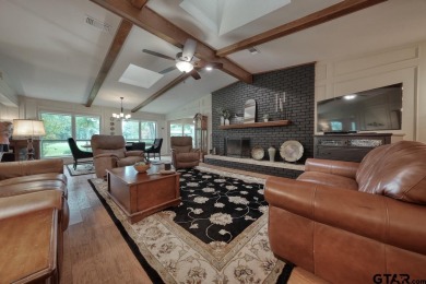 Nestled directly on the scenic Golf Course in Hideaway, this on Hide-A-Way Lake Golf Course in Texas - for sale on GolfHomes.com, golf home, golf lot