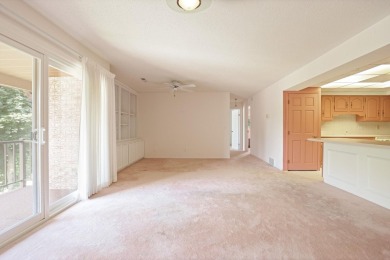 This top floor condo is located next to The Saginaw Country Club on Saginaw Country Club in Michigan - for sale on GolfHomes.com, golf home, golf lot