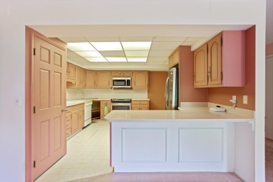 This top floor condo is located next to The Saginaw Country Club on Saginaw Country Club in Michigan - for sale on GolfHomes.com, golf home, golf lot