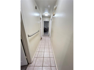 Centrally located this 4 bedroom 2 bath brick home offers on  in AL - for sale on GolfHomes.com, golf home, golf lot