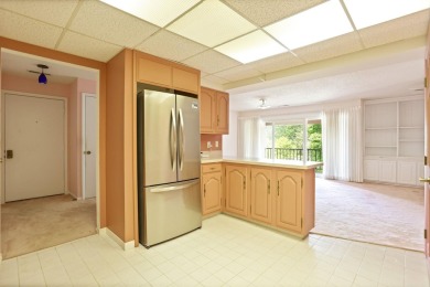 This top floor condo is located next to The Saginaw Country Club on Saginaw Country Club in Michigan - for sale on GolfHomes.com, golf home, golf lot