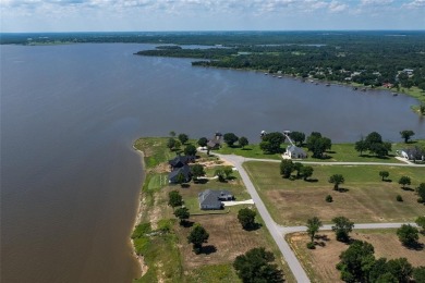 OPEN waterfront lot with gorgeous views to build your dream home on Cedar Creek Country Club in Texas - for sale on GolfHomes.com, golf home, golf lot