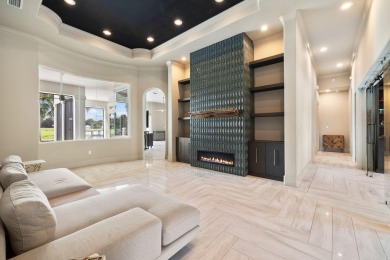 Welcome to 499 Regatta Bay Blvd, where modern elegance meets on Regatta Bay Golf and Country Club in Florida - for sale on GolfHomes.com, golf home, golf lot