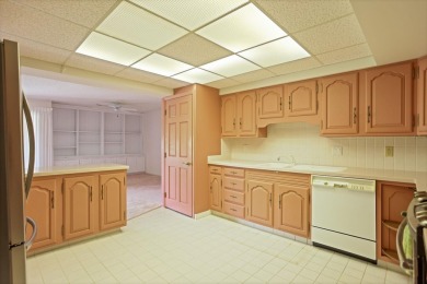 This top floor condo is located next to The Saginaw Country Club on Saginaw Country Club in Michigan - for sale on GolfHomes.com, golf home, golf lot