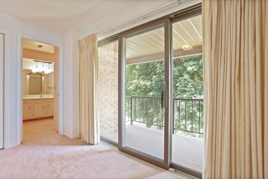This top floor condo is located next to The Saginaw Country Club on Saginaw Country Club in Michigan - for sale on GolfHomes.com, golf home, golf lot