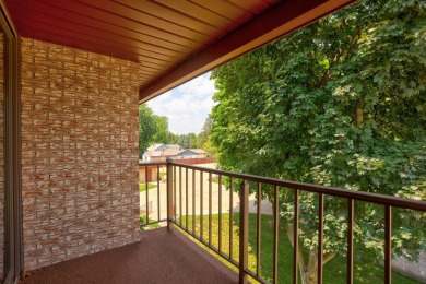 This top floor condo is located next to The Saginaw Country Club on Saginaw Country Club in Michigan - for sale on GolfHomes.com, golf home, golf lot