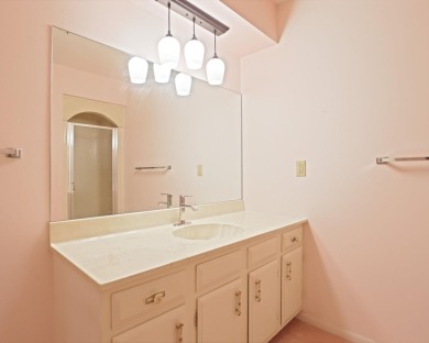 This top floor condo is located next to The Saginaw Country Club on Saginaw Country Club in Michigan - for sale on GolfHomes.com, golf home, golf lot