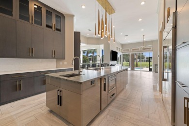 Welcome to 499 Regatta Bay Blvd, where modern elegance meets on Regatta Bay Golf and Country Club in Florida - for sale on GolfHomes.com, golf home, golf lot