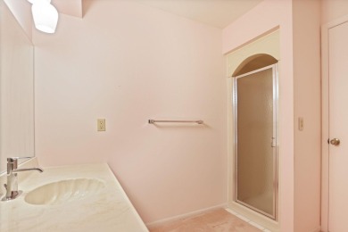 This top floor condo is located next to The Saginaw Country Club on Saginaw Country Club in Michigan - for sale on GolfHomes.com, golf home, golf lot