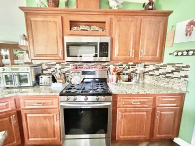 This lovely 3-bedroom, 2-bathroom manufactured home is located on Crane Lakes Golf and Country Club in Florida - for sale on GolfHomes.com, golf home, golf lot