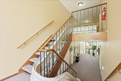 This top floor condo is located next to The Saginaw Country Club on Saginaw Country Club in Michigan - for sale on GolfHomes.com, golf home, golf lot