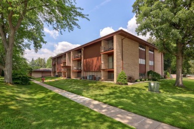 This top floor condo is located next to The Saginaw Country Club on Saginaw Country Club in Michigan - for sale on GolfHomes.com, golf home, golf lot
