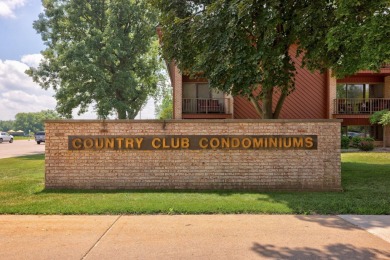 This top floor condo is located next to The Saginaw Country Club on Saginaw Country Club in Michigan - for sale on GolfHomes.com, golf home, golf lot