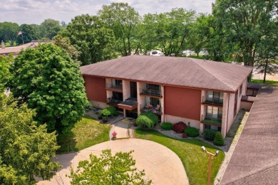 This top floor condo is located next to The Saginaw Country Club on Saginaw Country Club in Michigan - for sale on GolfHomes.com, golf home, golf lot