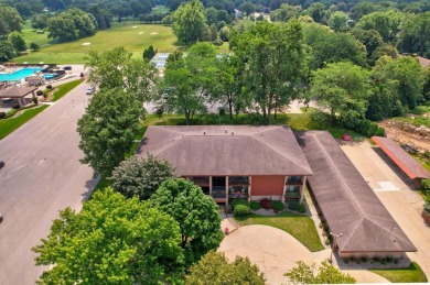 This top floor condo is located next to The Saginaw Country Club on Saginaw Country Club in Michigan - for sale on GolfHomes.com, golf home, golf lot
