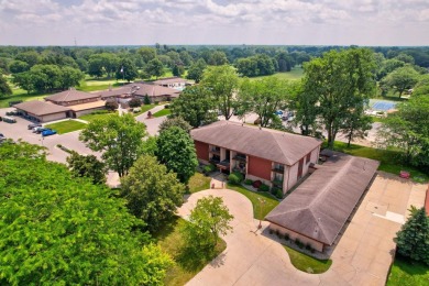 This top floor condo is located next to The Saginaw Country Club on Saginaw Country Club in Michigan - for sale on GolfHomes.com, golf home, golf lot