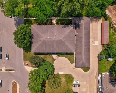 This top floor condo is located next to The Saginaw Country Club on Saginaw Country Club in Michigan - for sale on GolfHomes.com, golf home, golf lot