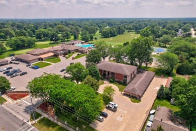 This top floor condo is located next to The Saginaw Country Club on Saginaw Country Club in Michigan - for sale on GolfHomes.com, golf home, golf lot