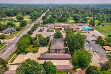 This top floor condo is located next to The Saginaw Country Club on Saginaw Country Club in Michigan - for sale on GolfHomes.com, golf home, golf lot