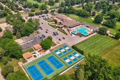 This top floor condo is located next to The Saginaw Country Club on Saginaw Country Club in Michigan - for sale on GolfHomes.com, golf home, golf lot