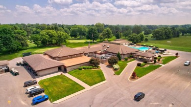 This top floor condo is located next to The Saginaw Country Club on Saginaw Country Club in Michigan - for sale on GolfHomes.com, golf home, golf lot