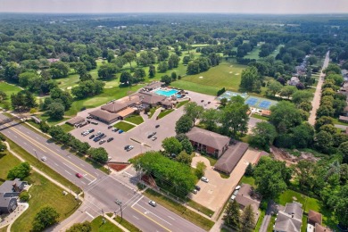 This top floor condo is located next to The Saginaw Country Club on Saginaw Country Club in Michigan - for sale on GolfHomes.com, golf home, golf lot